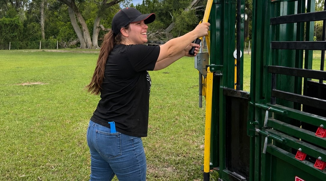 Jessica opening the farm gate